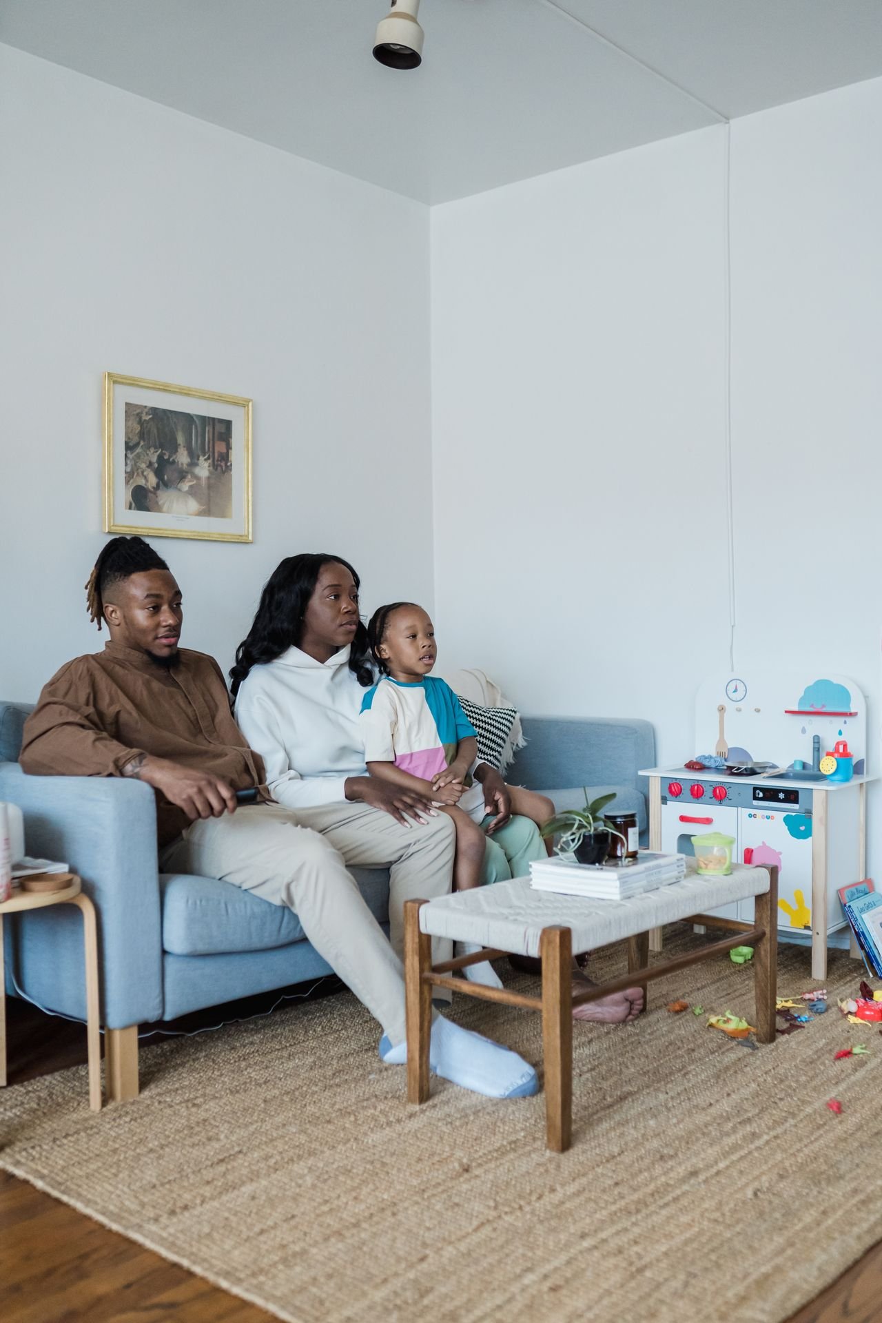 A family enjoying cable TV at home